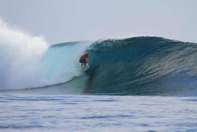 Hunter Turpin surfing a large wave.